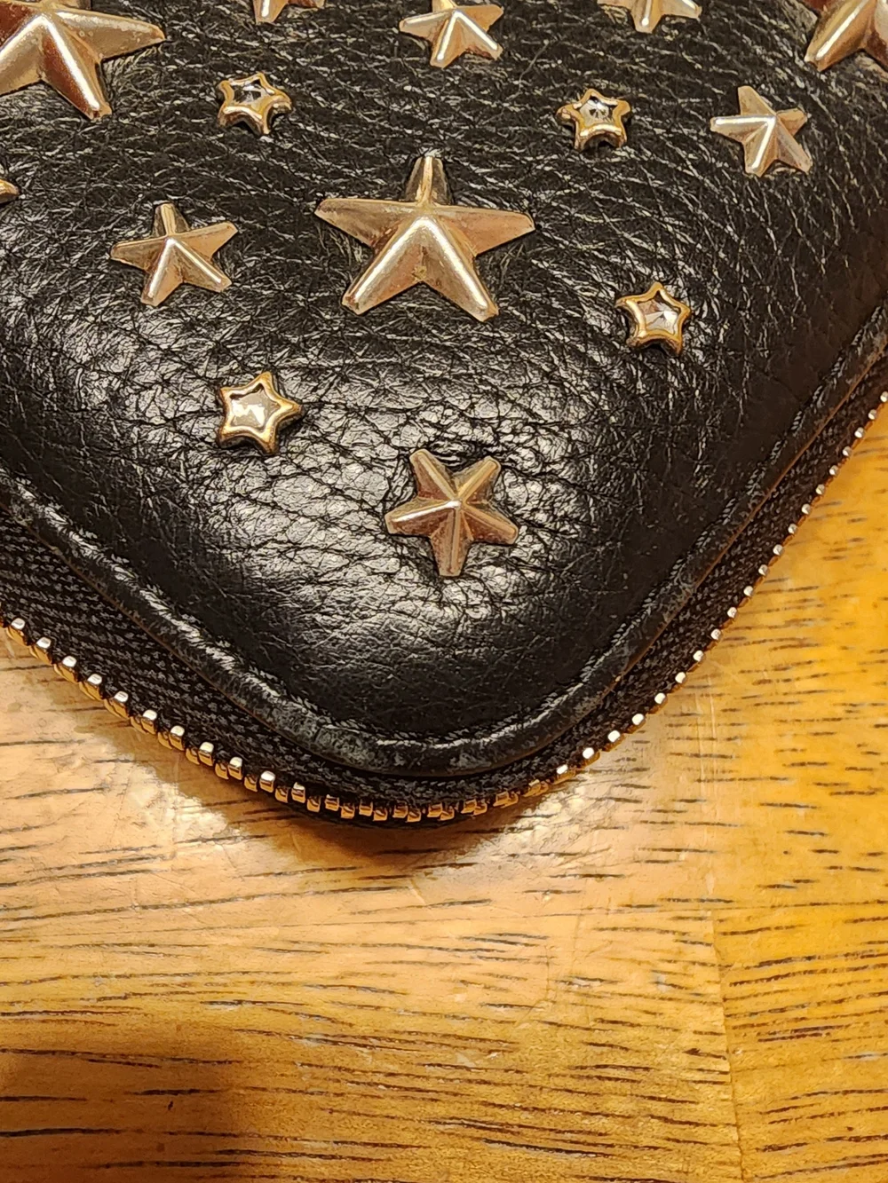 Jimmy Choo Filipa Star Studded Wallet, a black leather zip-around wallet
